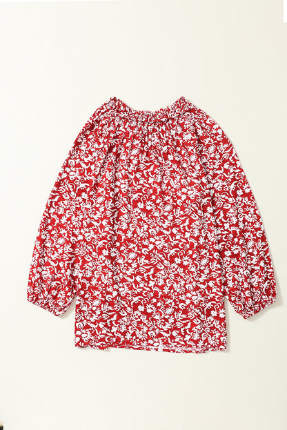 Burgunderrote Bluse mit Blumenmuster und gesmoktem Kragen und Schleife