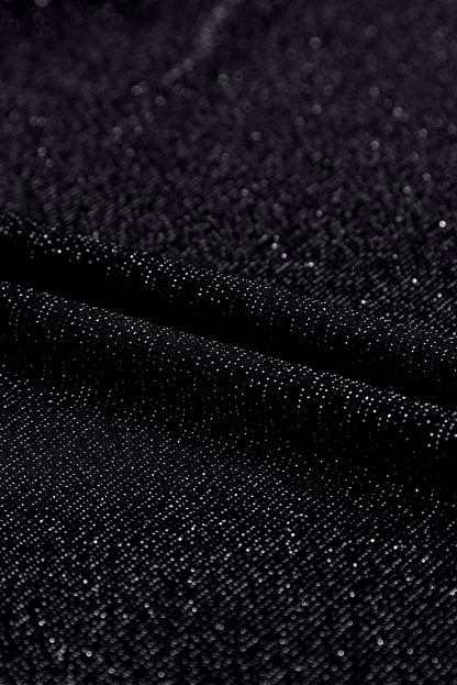 Schwarzes, glitzerndes Langarm-Top mit Rundhalsausschnitt