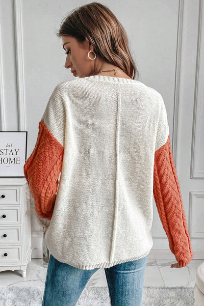 Pullover mit überschnittener Schulter und aufgesetzter Tasche in Colorblock-Optik in Gold Flame