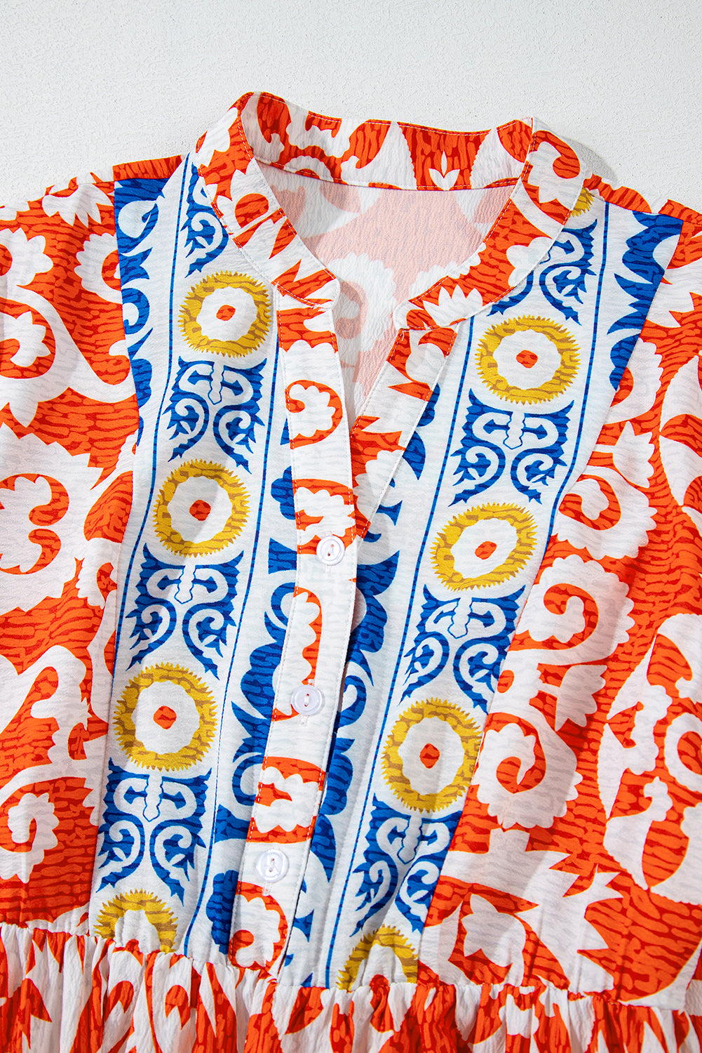 Oranges Boho-Maxikleid mit geometrischem Print und langen Ärmeln