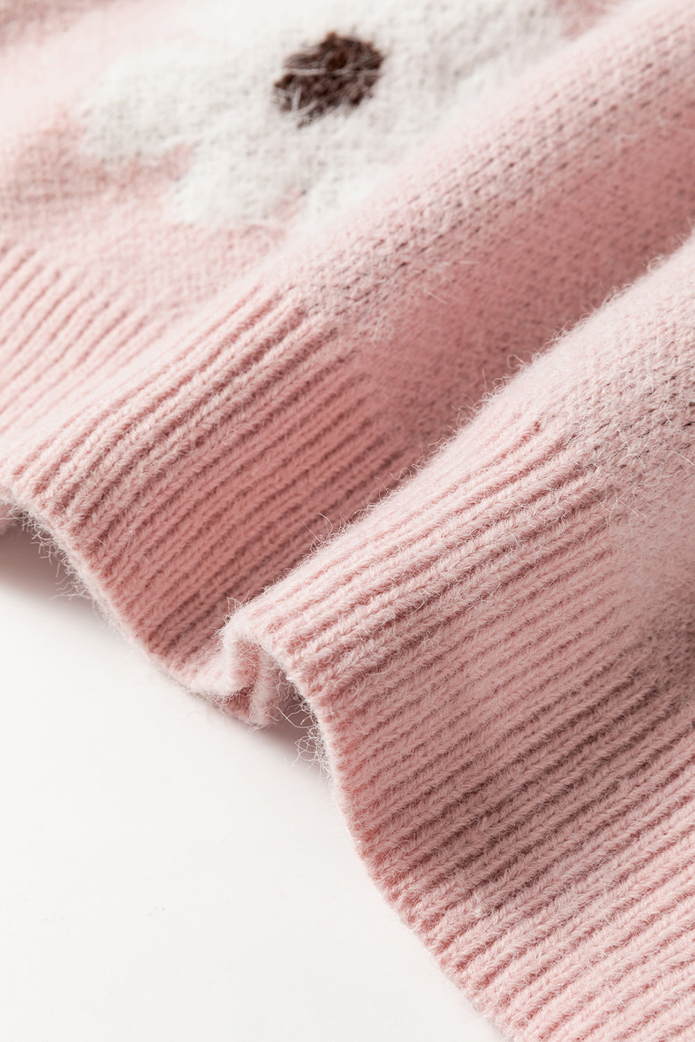 Rosa Pullover mit Blumenmuster und halblangem Reißverschluss sowie überschnittenen Schultern