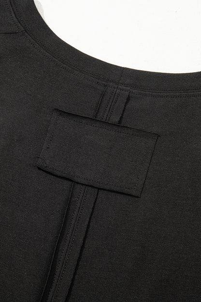 Schwarzes Oversize-Oberteil mit kontrastierendem Blumenmuster und Puffärmeln