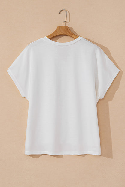 Weißes Top mit V-Ausschnitt und Dolman-Ärmeln und Blumenapplikation