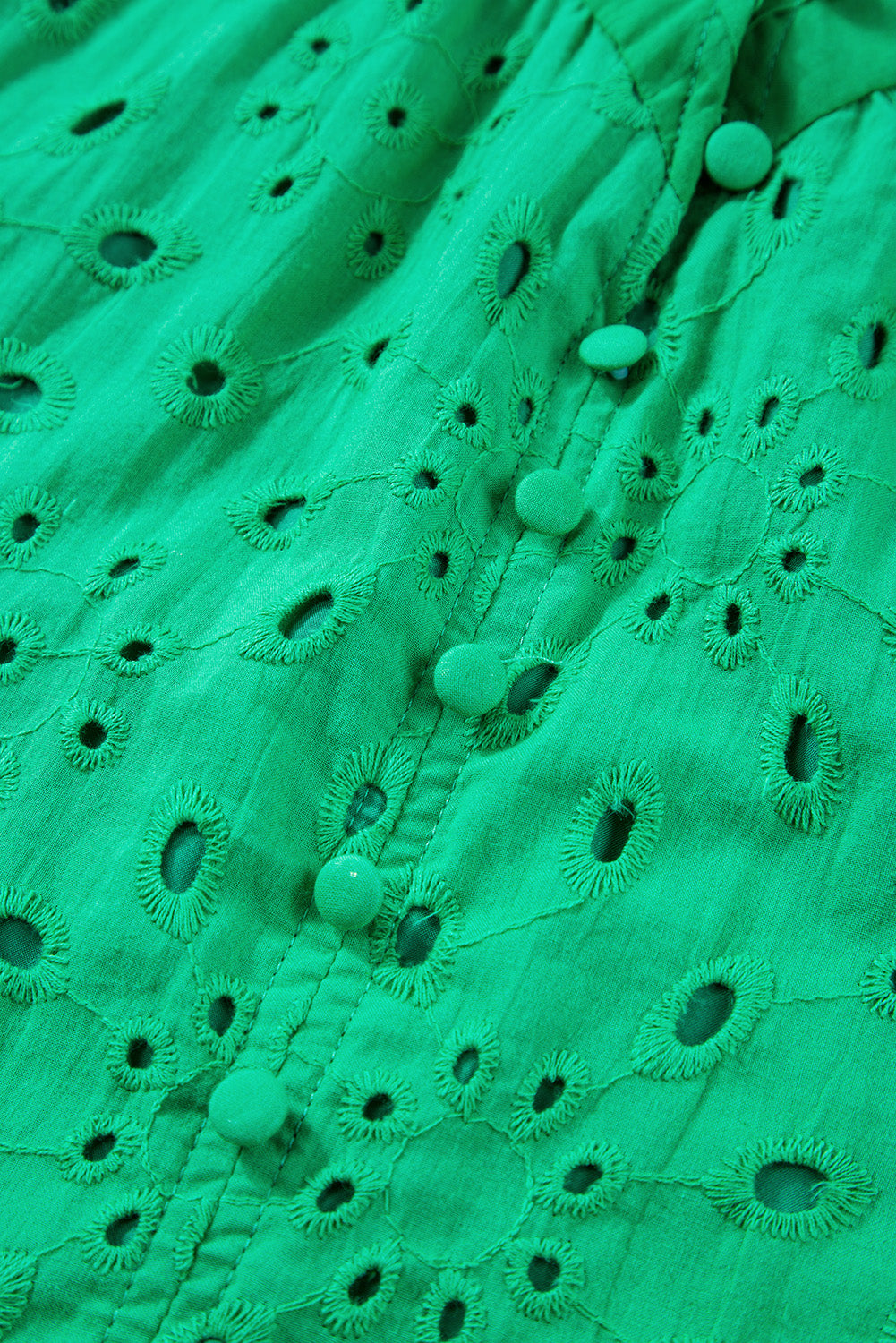 Grüne Bluse mit Blumenstickerei und Puffärmeln