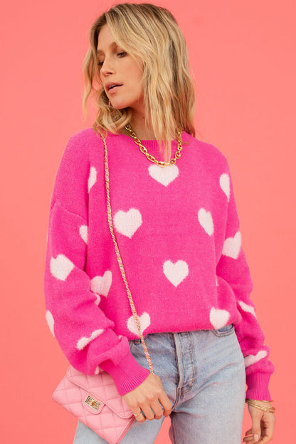 Hellrosa Pullover mit flauschigen Valentinstagsherzen und überschnittener Schulter