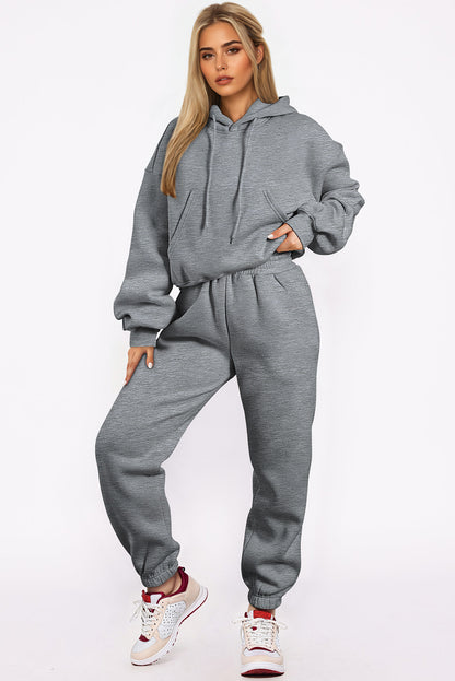 Graues Activewear-Set mit Kapuzenpullover und Jogginghose mit überschnittenen Schultern