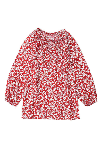 Burgunderrote Bluse mit Blumenmuster und gesmoktem Kragen und Schleife