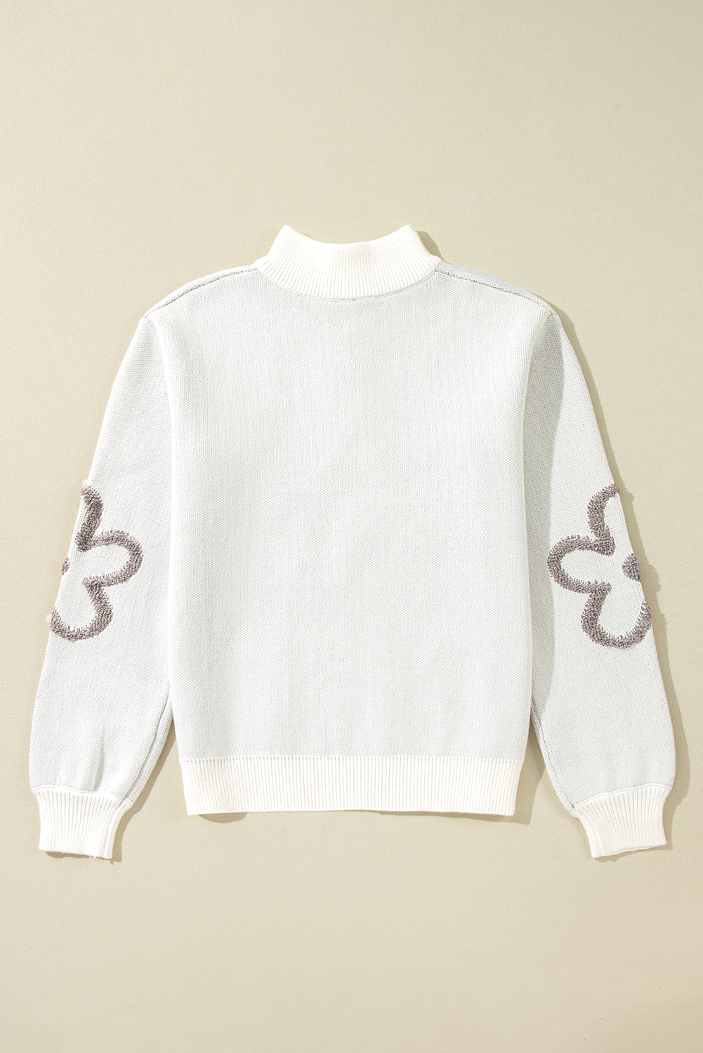 Weißer Pullover mit Stehkragen und halblangem Reißverschluss und Blumenmuster