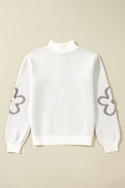 Weißer Pullover mit Stehkragen und halblangem Reißverschluss und Blumenmuster