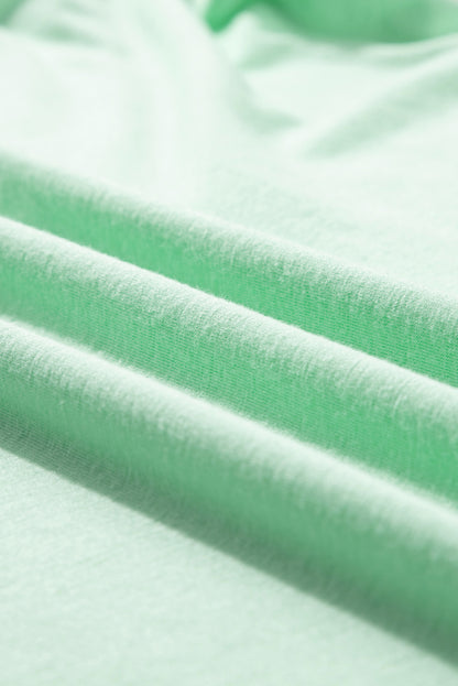 Islandblaues T-Shirt mit Rundhalsausschnitt und gerollten Ärmeln in Übergröße