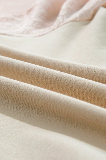 Pullover mit Raglanärmeln und Lochmuster im Patchwork-Stil aus Pergament