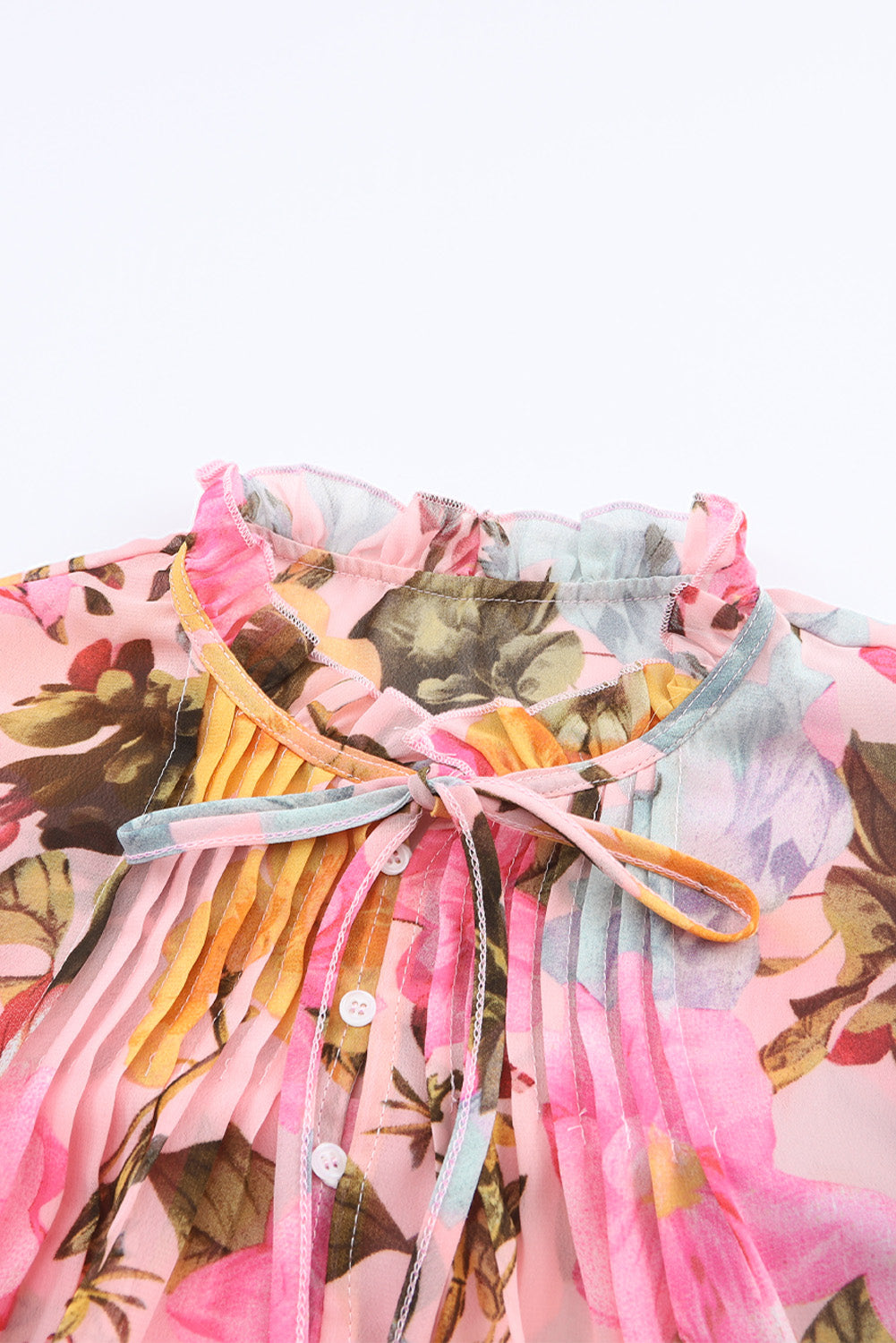 Rosa Bluse mit Blumenmuster und Rüschen