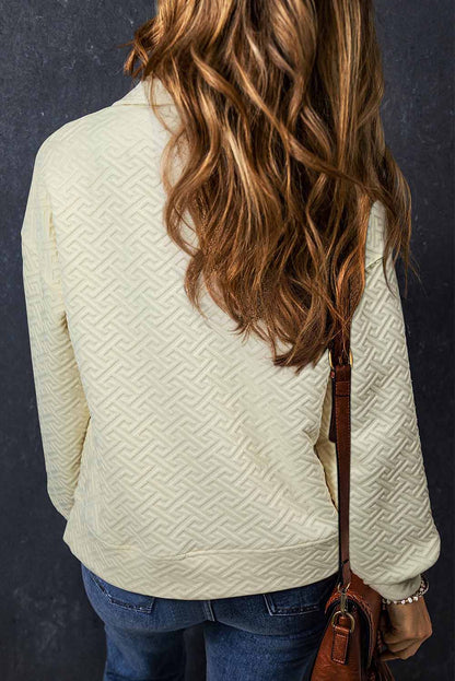 Beiges, einfarbiges Sweatshirt mit halbem Reißverschluss und Kragen
