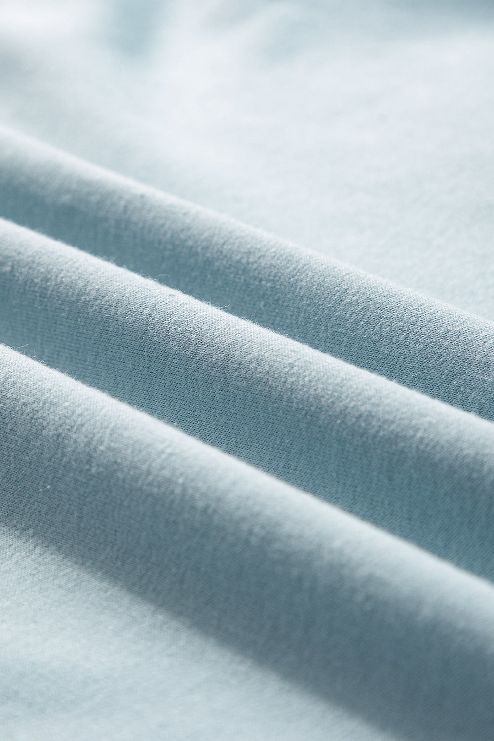 Iceland Blue Solid Tunika-Hoodie mit Rüschensaum und lockerer Passform