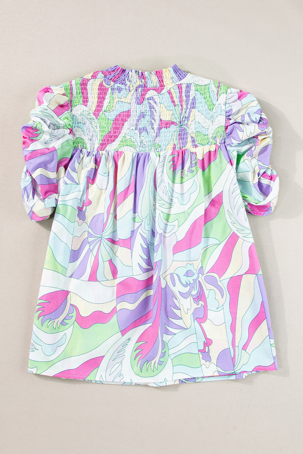 Grüne Bluse mit abstraktem Print und Puffärmeln