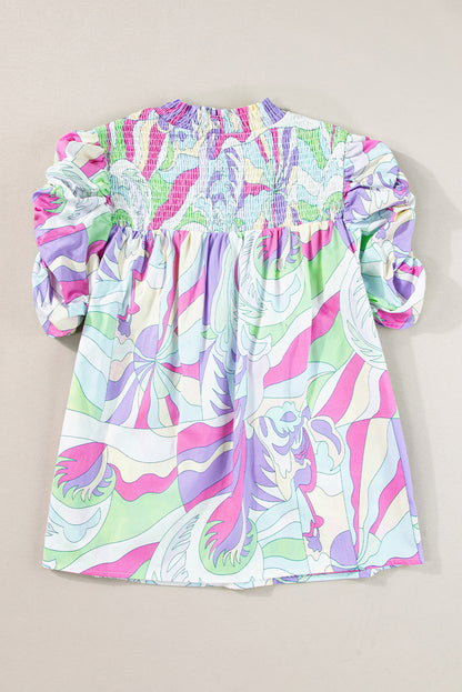 Grüne Bluse mit abstraktem Print und Puffärmeln