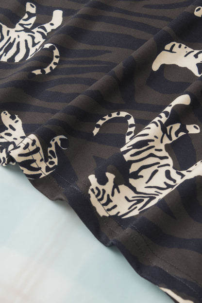 Schwarzes, stylisches Oberteil mit Rüschenärmeln und Animalprint