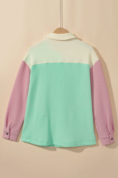 Grüne Steppjacke mit Patchwork-Patchwork-Klappentasche und Farbblock