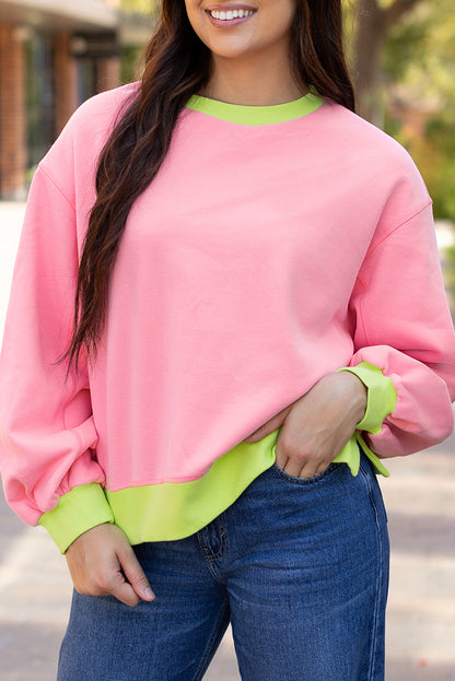 Rosa Sweatshirt mit Farbblock-Muster und Puffärmeln