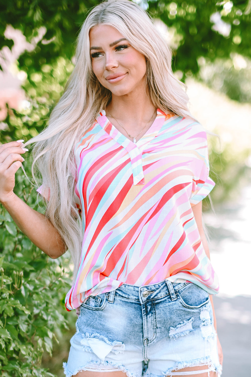 Mehrfarbige Bluse mit abstraktem Print und kurzen Ärmeln