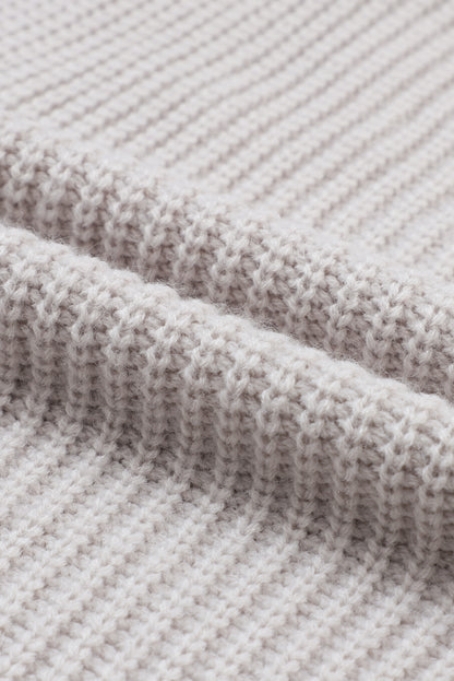 Grauer Oversize-Strickpullover mit umgeschlagenen Ärmeln
