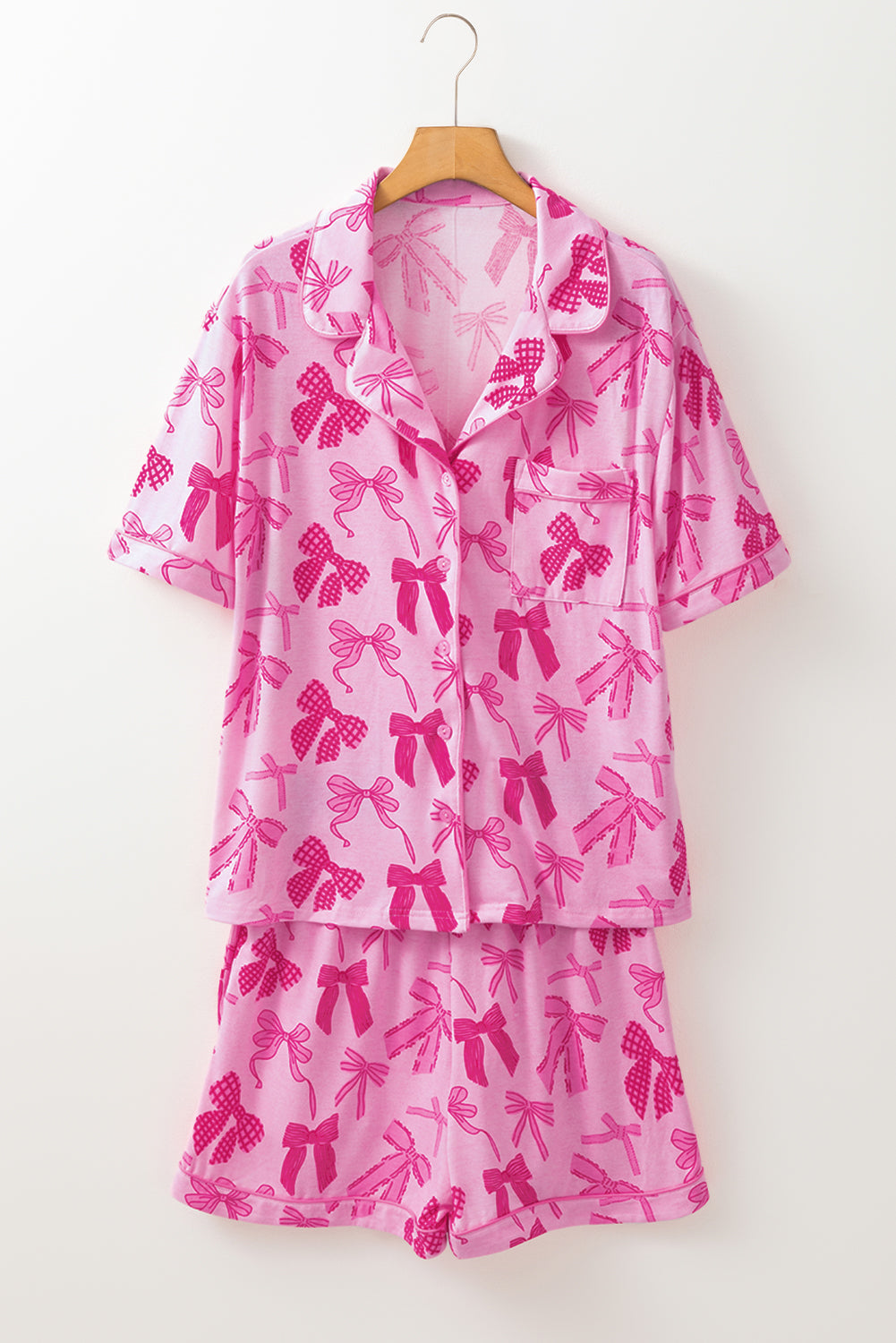 Rosa Pyjama-Set mit halblangen Hemden und Shorts mit Schleifenmuster