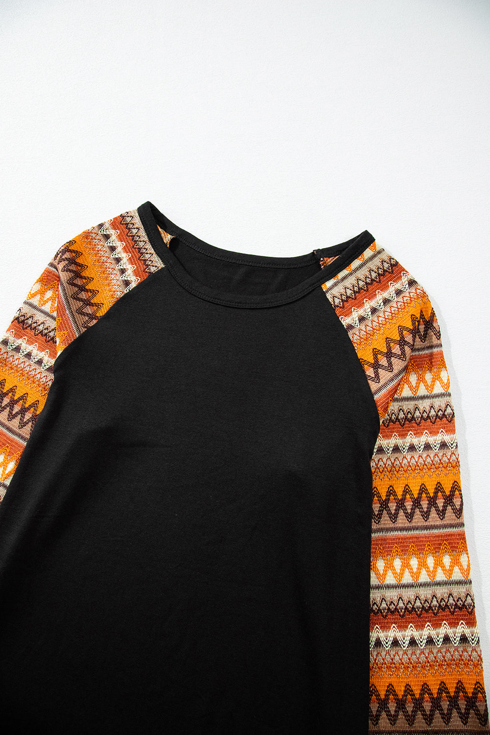 Oranges Raglan-Patchwork-Langarm-T-Shirt mit Geo-Print