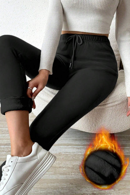 Schwarze Leggings mit Thermofutter und hoher Taille und Kordelzug