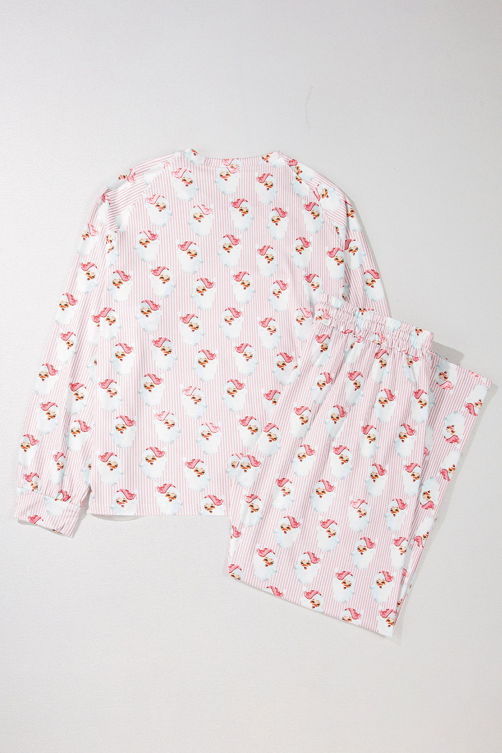 Rosa, locker geschnittenes, zweiteiliges Lounge-Set mit gestreiftem Weihnachtsmann-Print