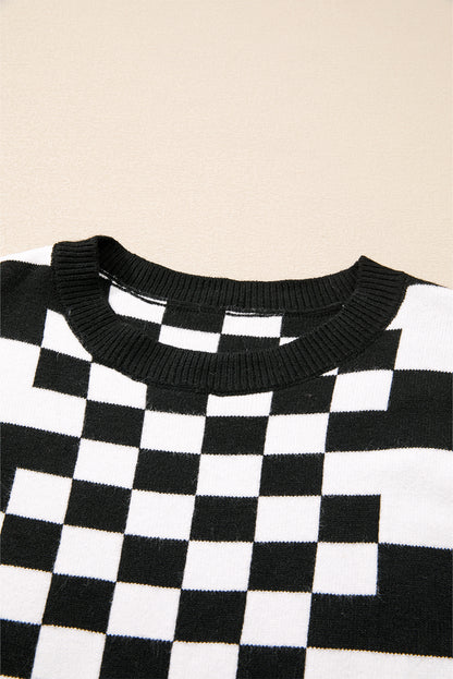 Schwarzer Pullover mit Karomuster und überschnittener Schulterpartie und Rundhalsausschnitt