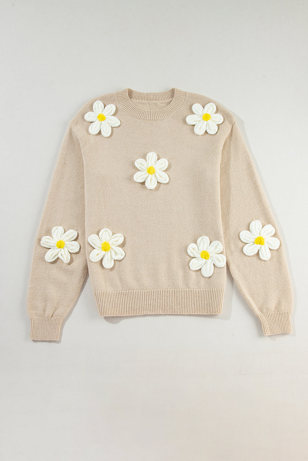 Grobstrickpullover mit Häkelmuster und Blumenmuster