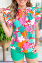 Grüne Bluse mit Blumenmuster, Krawatte, Schlitz am Hals und Rüschenbesatz