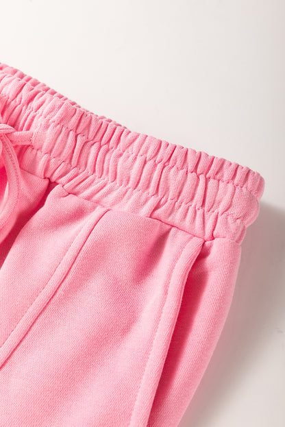 Set aus einfarbigem Patchwork-Pullover-Oberteil und Cargohose in Sachet-Rosa