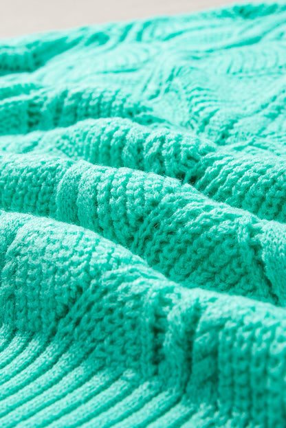 Mintgrüner Strickpullover mit V-Ausschnitt und überschnittenen Schultern