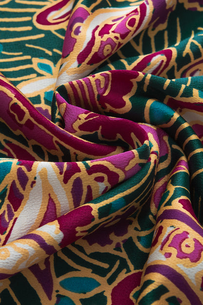 Grüne Paisley-Bluse mit V-Ausschnitt und kurzen Puffärmeln