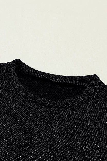 Schwarzes, glitzerndes Langarm-Top mit Rundhalsausschnitt