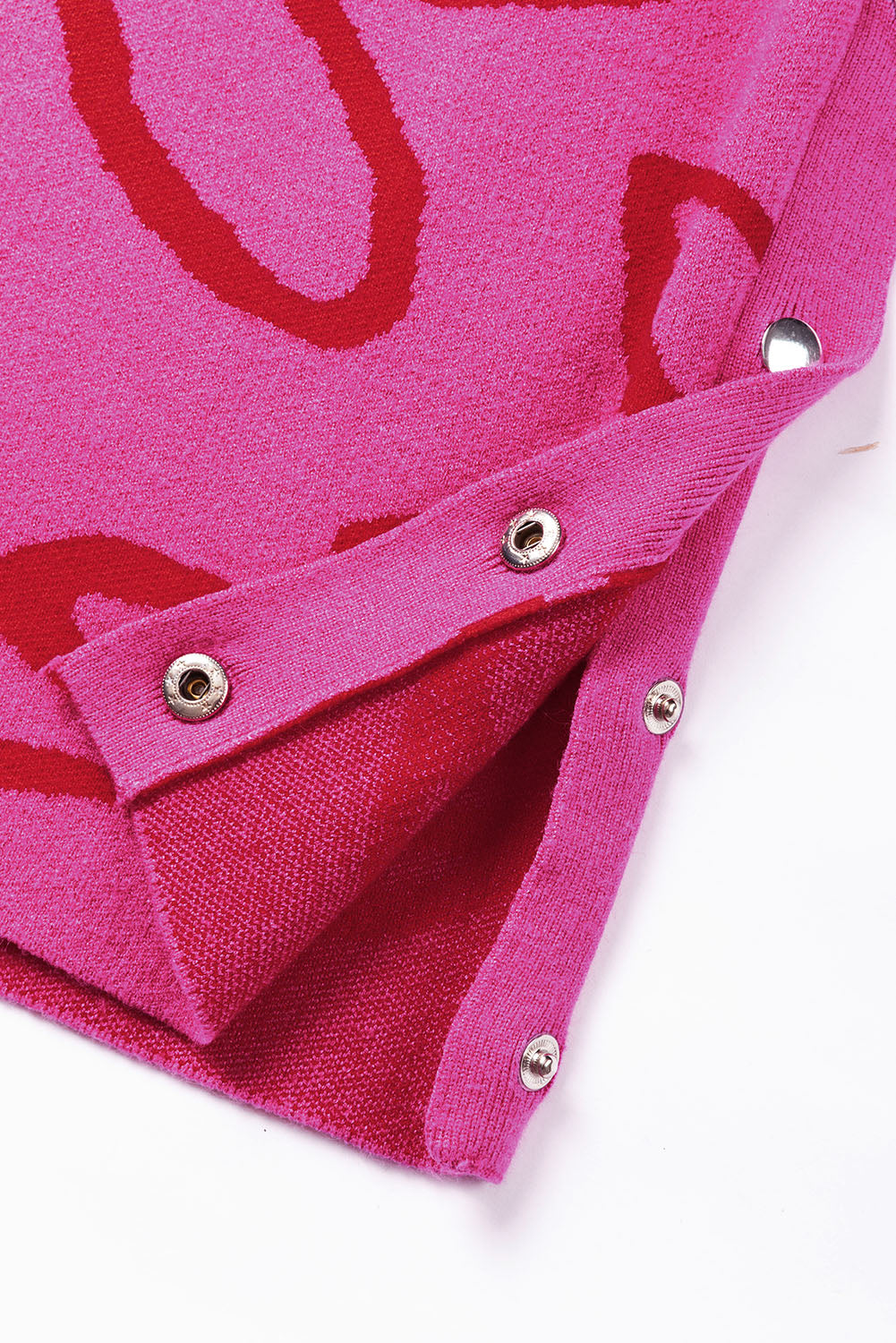 Ärmelloses Stricktop mit Blumenmuster und Knopfleiste in leuchtendem Pink