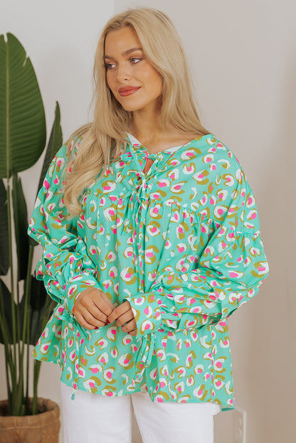 Grüne Babydoll-Bluse mit abstraktem Print und Schnürung und Laternenärmeln