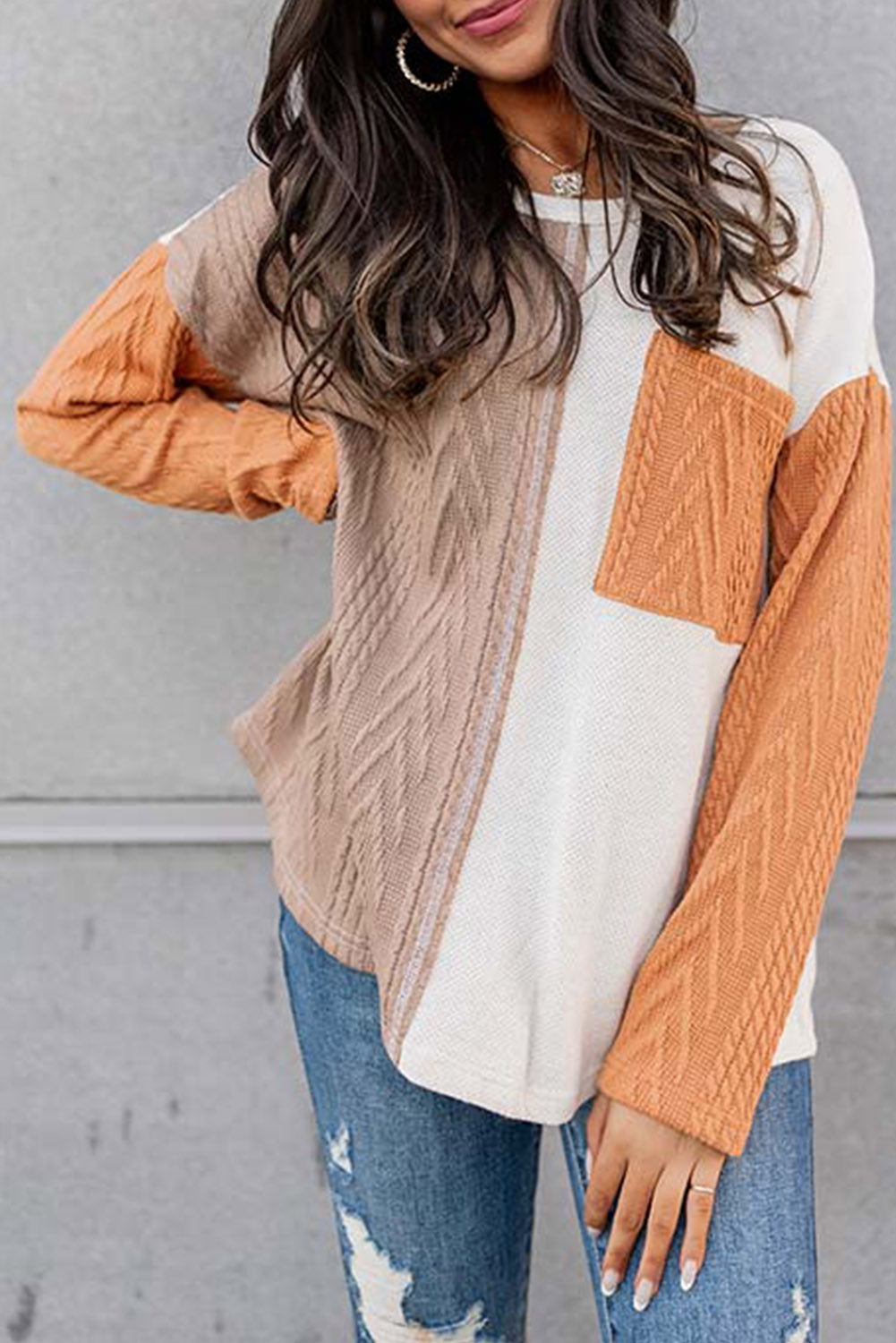 Oranges, langärmliges, strukturiertes Strickoberteil mit Colorblock-Brusttasche