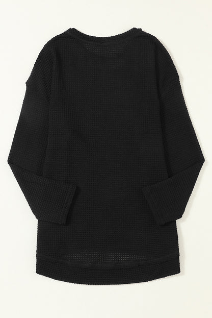 Schwarzes Oversize-Oberteil mit hohen Schlitzen und Waffelstrick