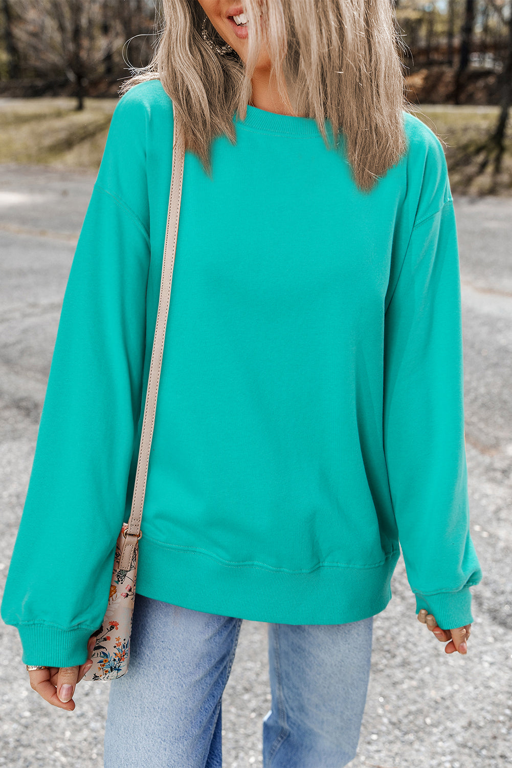 Aruba Blaues, schlichtes Sweatshirt mit Rundhalsausschnitt und überschnittener Schulter