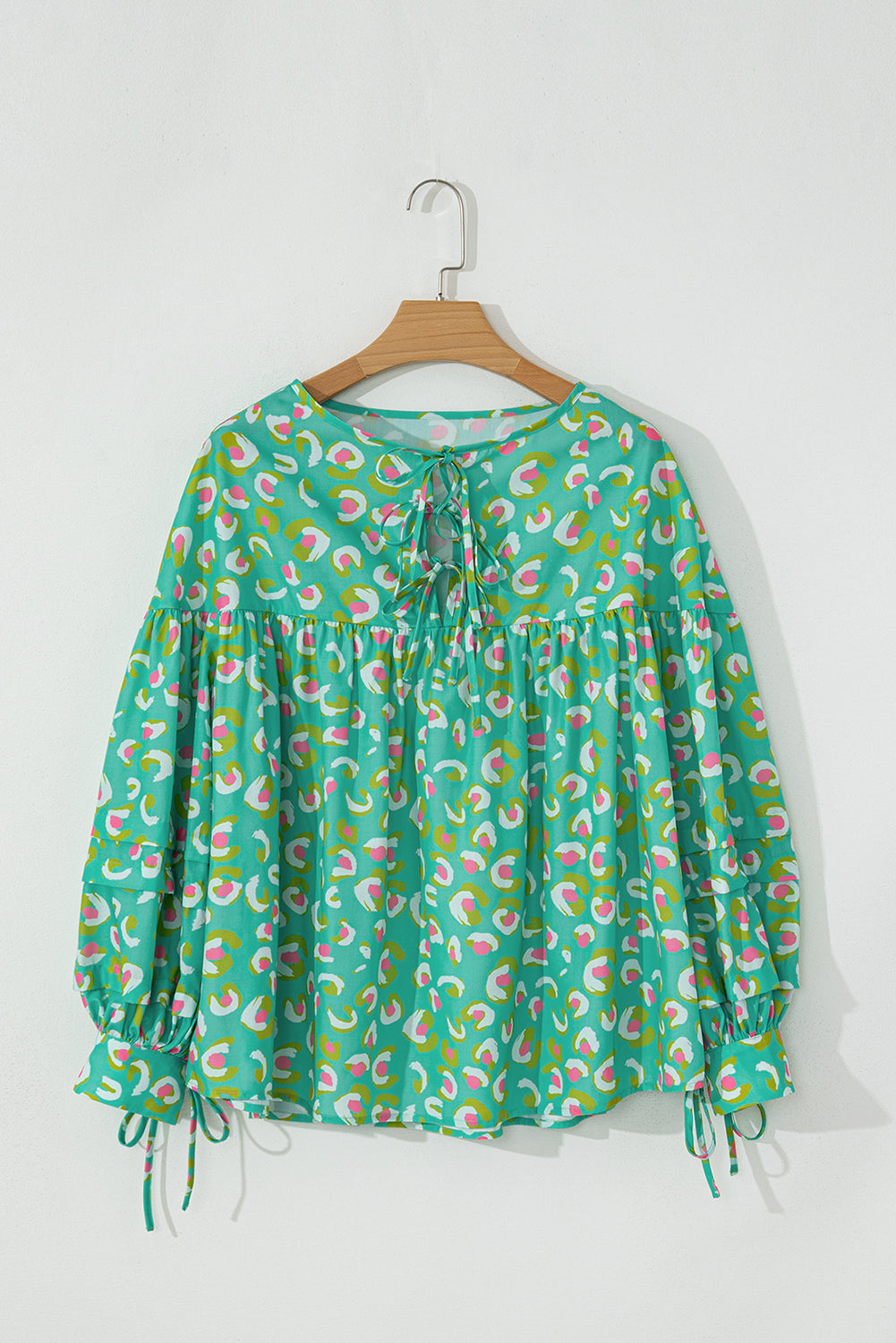 Grüne Babydoll-Bluse mit abstraktem Print und Schnürung und Laternenärmeln