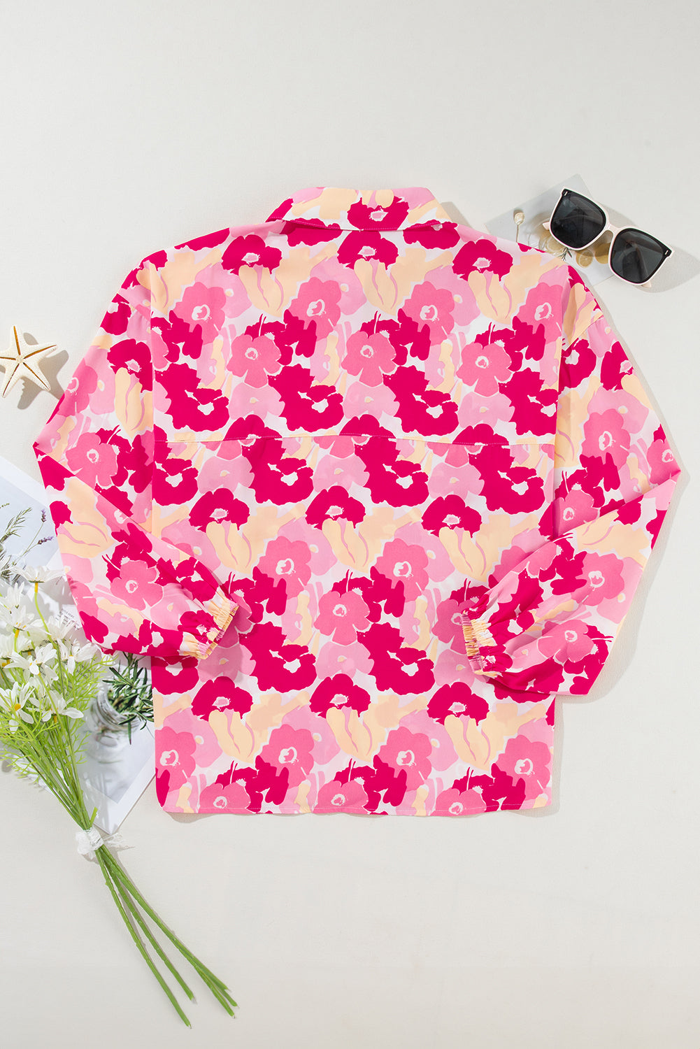 Rosafarbenes Hemd mit Puffärmeln und Blumenmuster