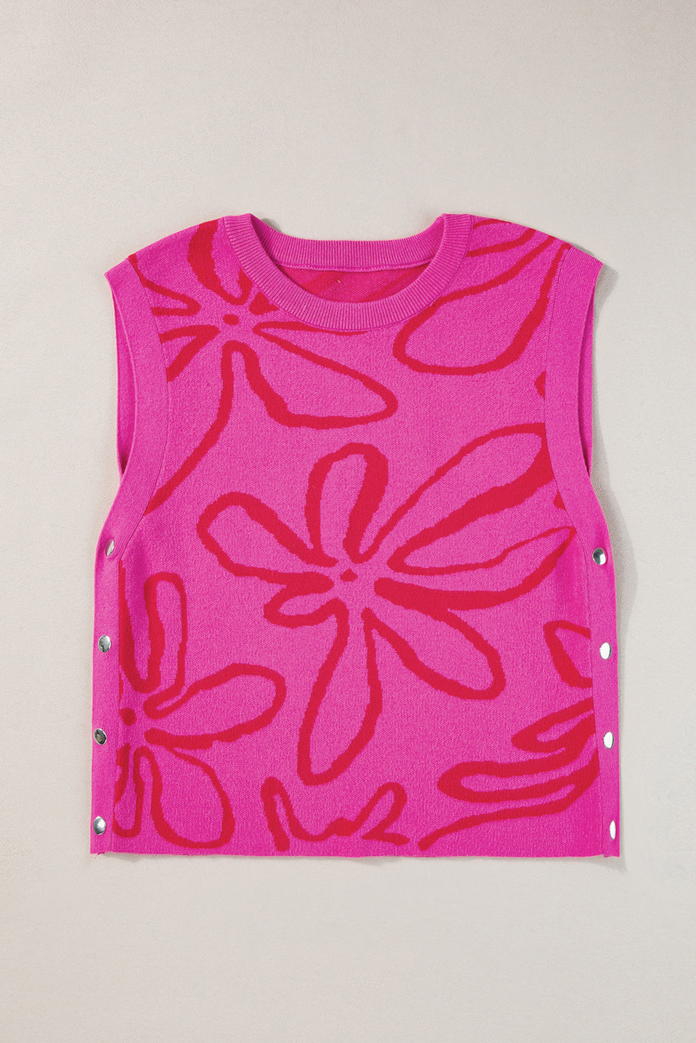 Ärmelloses Stricktop mit Blumenmuster und Knopfleiste in leuchtendem Pink