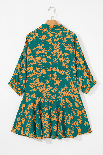 Grünes, fließendes, kurzes Tunika-Kleid mit Blumenmuster und Kordelzug