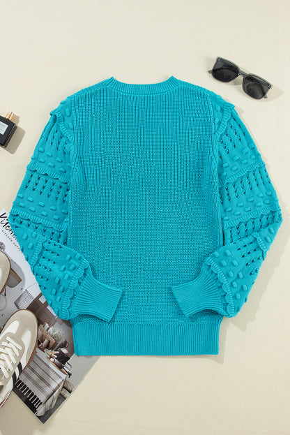 Türkisfarbener Pullover mit gerüschten Ösenärmeln