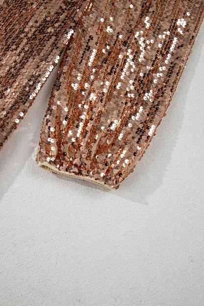 Goldfarbenes, Paillettenbesetztes Minikleid mit langen Ärmeln und Cut-Out am Rücken