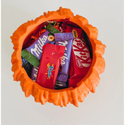 Schmelzende Halloween-Kürbis-Süßigkeitenschale