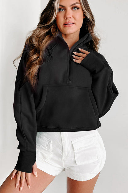 Schwarzes Sweatshirt mit Viertelreißverschluss, Stehkragen und Kängurutasche