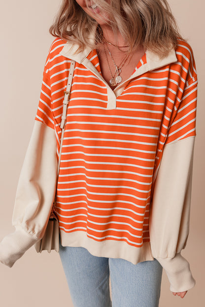 Orangefarbenes Sweatshirt mit Farbblockdesign und lockerer Passform, Kragen und überschnittenen Schultern